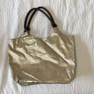 Neiman Marcus tote. Shimmery, pale gold snakeskin pattern.
